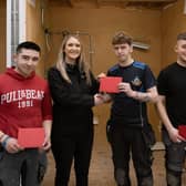 Electrical winner Kyle Hylands and runners up Andrew McBride and Joel Brown, with Rachel McKeeman of CITB.