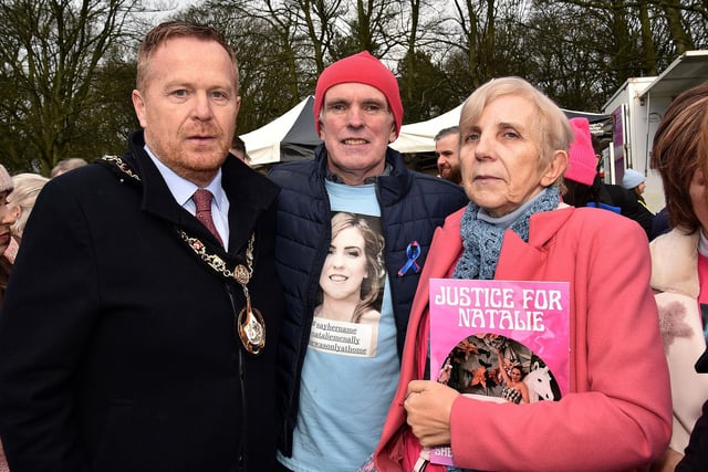 Mayor of Armagh, Banbridge and Craigavon Council, Councillor Paul Greenfield pictured with the parents of Natalie McNally, Noel and Bernadette at the rally in Lurgan Park. lm05-221.