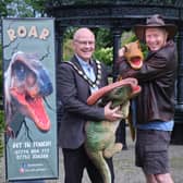 Mid Ulster District Council Chair, Councillor Dominic Molloy gets to meet some of the dinosaurs that will make an appearance at Roar Roar Dinosaur in Maghera Walled Garden on  September 9. Picture: Mid Ulster District Council