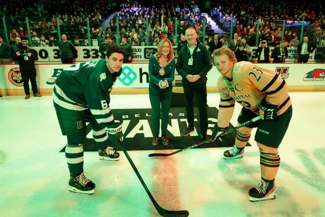 The Lord Mayor of Belfast, Councillor Christina Black drops the ceremonial puck with Martin McDowell, Odyssey Trust chairman and Dartmouth captain Tanner Palocsik and Quinnipac Bobcats captain Zach Metsa before Friday’s prestigious Friendship Four tournament at The SSE Arena, Belfast. Four top US college ice hockey teams will battle it out for the coveted Belpot trophy.   Photo by William Cherry/Presseye