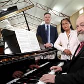 Ulster Bank business development manager Lee White (left) with business owners Steven Russell and his partner Jeena who have set up a new warehouse between Lurgan and Moira to sell pianos wholesale.