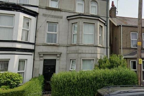 Planning approval has been granted for this end-of-terrace family home (grey façade, black door) to become a house of multiple occupancy. Credit: Google