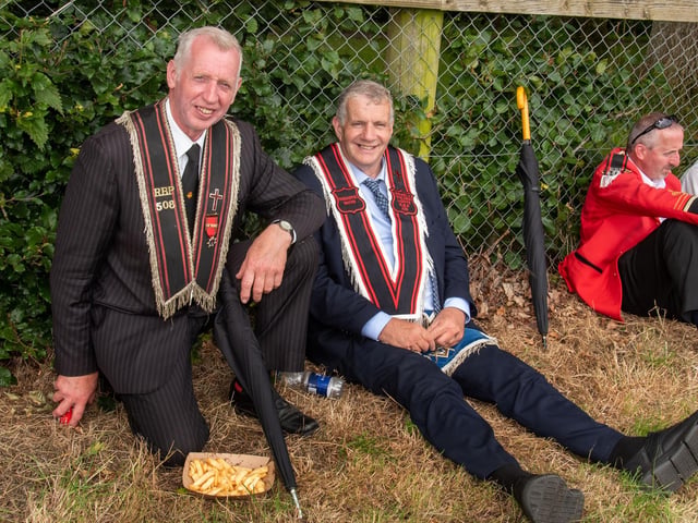 Enjoying a break at the field in Scarva are Samuel Smyth, left, and David Haddock. TH 117.