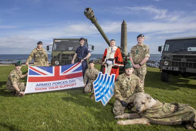 Launching the event recently was the Mayor of Mid and East Antrim, Alderman Noel Williams, with military personnel.