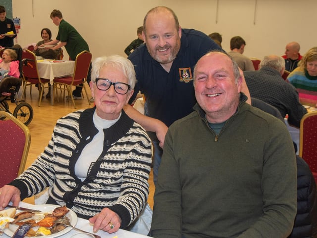 Posing for the camera at the Big Breakfast are from left, Mildred Maclean, Neil Maclean and Robert Johnston.
