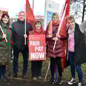 Striking health workers on picket duty at Portadown Health Centre. Included are from left, Kathleen Greaney, Conleth Grimley, Gerardette McVeigh, Louise Geary and Carol Cooper. PT05-209.