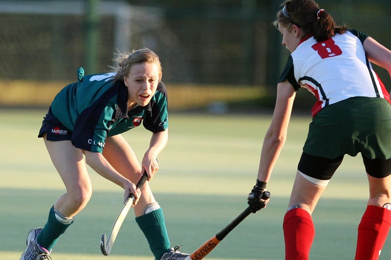 Carrick's Lois Passmore takes on her Greenisland opponent in a 2010 clash. CT16-424RM