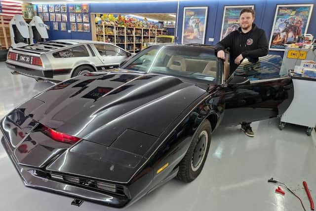 Lurgan man David Abraham with his replica of the Knight Industries Two Thousand or KITT. His De Lorean car can also be seen in the background.