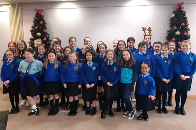 The wonderful pupils of St Francis Primary School in Lurgan sang a number of beautiful Christmas carols at the Southern Area Hospice Light Up a Life ceremony in Craigavon Civic Centre on Tuesday.