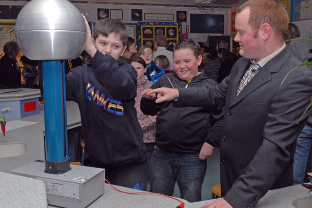 Brownlow College science teacher Mr Stephen Smyth with Junior Linden, Drumgor PS and Mark McKerr, Bleary PS at the open night in 2010.
