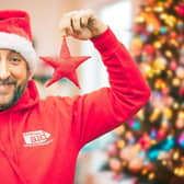 Rev Dr André Alves-Areias, minister of Mosside and Toberdoney Presbyterian Churches near Ballymoney, is shining a light on extreme poverty in Bangladesh this festive season by hanging a handmade sari-star on his Christmas tree. Credit Christian Aid