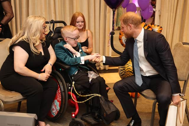 Blake McCaughey fist bumps with Prince Harry a the Hurlingham Club in London. Picture: Antony Thompson / TWM