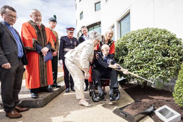 L-R: Archdeacon Paul Dundas; chair of LCCC's Corporate Services Committee, Cllr Brian Higginson; Lord Lieutenant's Cadet, Harry Martin; Lord Lieutenant, Mr David McCorkell; LCCC chief executive, David Burns; Mrs Lynn Kirk (Tommy's daughter); Thomas Doherty and Mayor, Ald Amanda Grehan, taking part in a tree planting ceremony at Lagan Valley Island to honour Mr Doherty's new status as Freeman of the City of Lisburn and Castlereagh. McAuley Multimedia Ltd