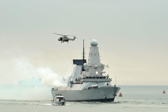 HMS Diamond kicks off the Diamond Jubilee celebrations with a 21 gun salute to The Queen as the type 45 destroyer returns to Portsmouth Harbour.
Picture: Steve Reid (121903-785)
