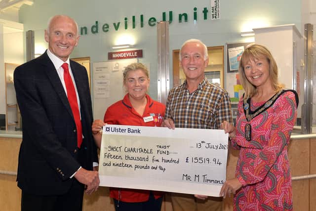 Michael Timmons presented a cheque to  Mr Don Hull Consultant Haematologist, and Acting Ward Manager of Mandeville Unit Claire O’Connor. Also pictured is Lord Mayor of Armagh City, Banbridge, and Craigavon Borough Alderman Margaret Tinsley. Pic credit: Tony Hendron