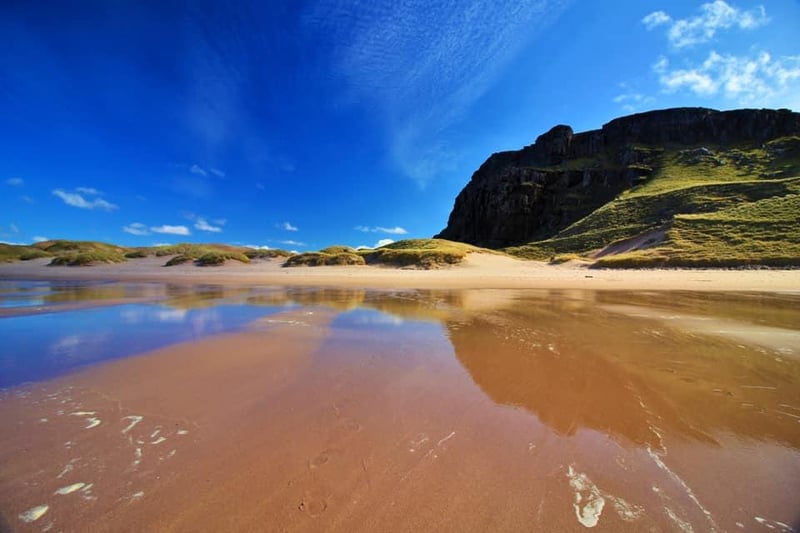 This bay in Sutherland has a reputation as the most beautiful beach in Britain. Described as "wild and spectacular", it is backed by huge sand dunes and a loch.