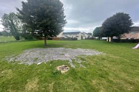 Sewerage splurge over children's playing field at Drumellan, Craigavon, Co Armagh.