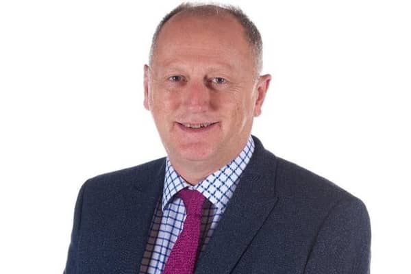 Stephen Mulligan receives an MBE for services to education. Photo submitted