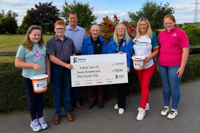 At the cheque presentation following the Tandragee 100 Road Race fundraising event are, from left: Hannah Dillon, Harry Dillon, Neil Dillon, Ian Forsythe (Tandragee 100), Anne Forsythe (event director Tandragee 100), Jo-Anne Dobson (Northern Ireland Ambassador, Kidney Care UK) and Charlotte Dillon. The presentation marked the donation of £750 raised through spectator parking at Neil’s field during this year’s Tandragee 100 Road Races in aid of Kidney Care UK.