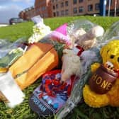 Flowers and soft toys left on Atlantic Way in Bundoran town in tribute to Ronan Wilson from Kildress in Co Tyrone, who was killed in a hit-and-run. The nine-year-old killed had been visiting the Donegal town of Bundoran when he was struck by a vehicle on Saturday evening. Credit: PA