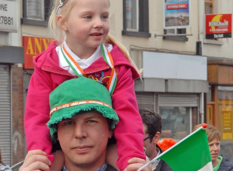 Getting a lift in the parade.
