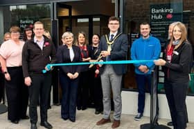 Mayor of Causeway Coast and Glens, Cllr Ciaran McQuillan, officially opens the new Portrush banking hub with representatives from Cash Access UK and local staff. CREDIT CASH ACCESS UK