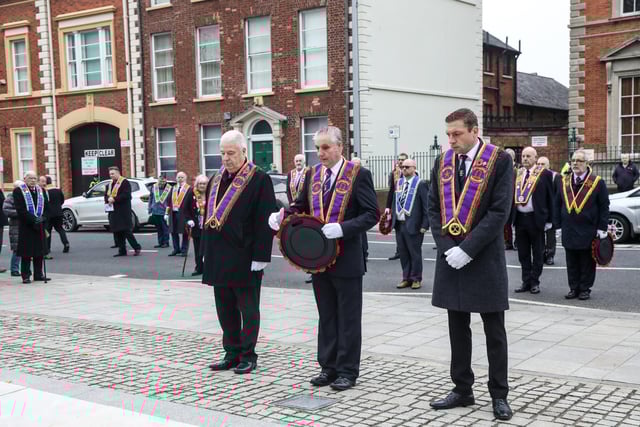 Laying wreaths at the Lisburn War Memorial