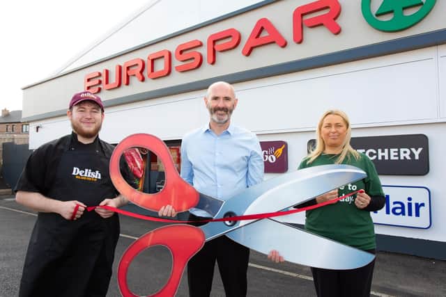 Store Manager Conor Finnegan (centre) is pictured with Food To Go Manager Kyle McLoughlin (left) and Community Rep Beata Smyth at the official reopening of EUROSPAR Lurgan on the Gilpinstown Road.