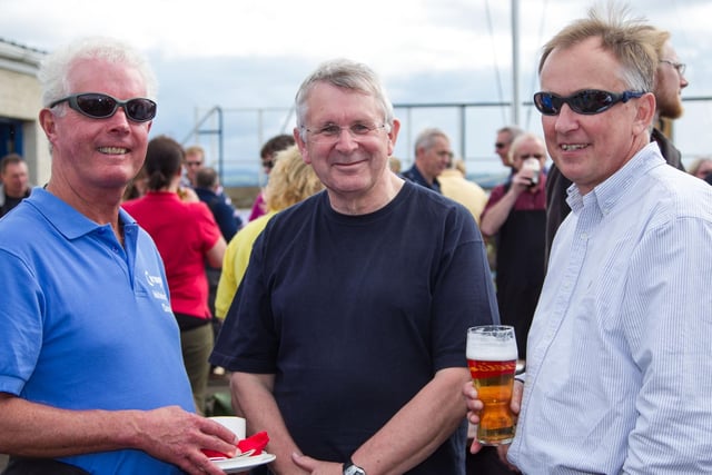 Colin Ogilby, Alan Montgomery and Trevor McKaig enjoying the atmosphere at Carrick Sailing Club in 2012.   INLT 35-419-RM