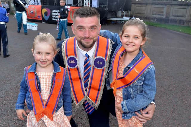 Scott White with daughters, Ebony (4) and Elodie (6) members of LOL 44, Brownlow House pictured before the Lurgan mini 12th parade on Friday. LM27-257.