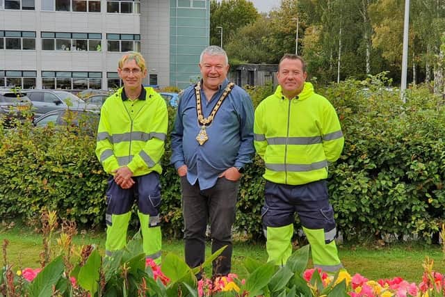 The Mayor of Causeway Coast and Glens Borough Council, Councillor Ivor Wallace, pictured with Parks staff Rodney Boyd and Winston Brogan.