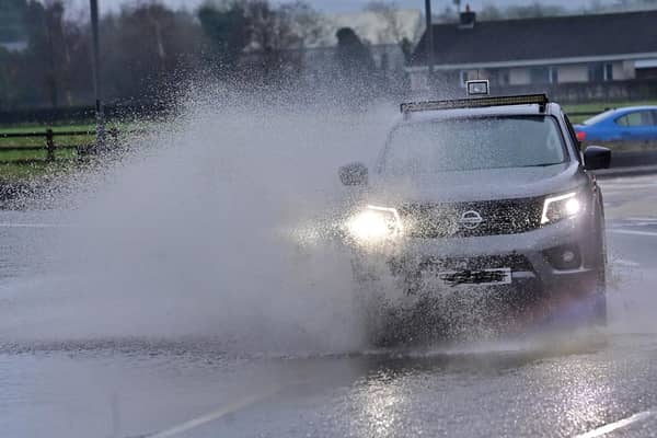 Police have urged road users to take extra care when driving during heavy rain and flooded roads. Picture: Colm Lenaghan/Pacemaker (stock image).