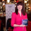 ​Sinéad Lunny of Banbridge-based Vocalis Public Speaking with her FSB Self-Employed Award.