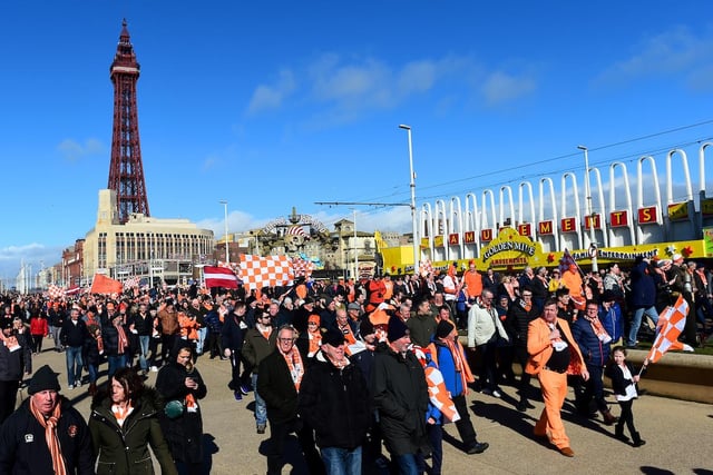 Blackpool fans marched from the Tower to the stadium, proudly donning their tangerine colours