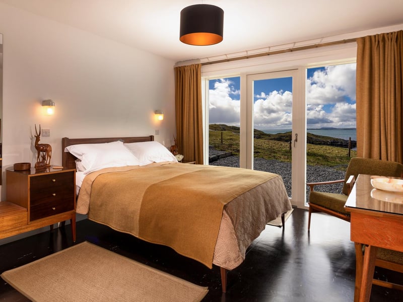 Wake up at the Sound of Harris and see spectacular views from your own bed.