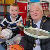 Ruairi McLaughlin with the Mayor, Councillor Steven Callaghan at the unveiling of the new multi-use games area at Magilligan Community Centre.