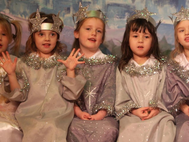 FIVE STARS. These little'uns from St Brigid's PS look the part in 2009 during their Christmas concert.