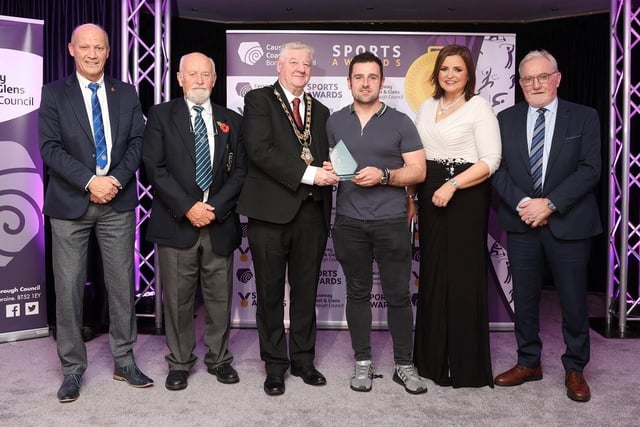 Road racing legend Michael Dunlop received this year’s Chairperson’s Award at the Causeway Coast and Glens Sports Awards. He is pictured at the gala awards event in the Lodge Hotel, Coleraine alongside Richard Briggs (Chair of Coleraine Sports Advisory Council), John McMullan (Chair of Ballymoney Sports Advisory Council), Tom Christie (Chair of Moyle Sports Advisory Council), host Denise Watson and Mayor of Causeway Coast and Glens, Councillor Steven Callaghan.