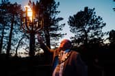 Mayor of Antrim and Newtownabbey, Councillor Neil Kelly lights the beacon at Antrim Castle Gardens to mark 80 years since VE Day