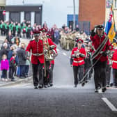 Larne's Remembrance Sunday parade makes its way to the town's War Memorial.