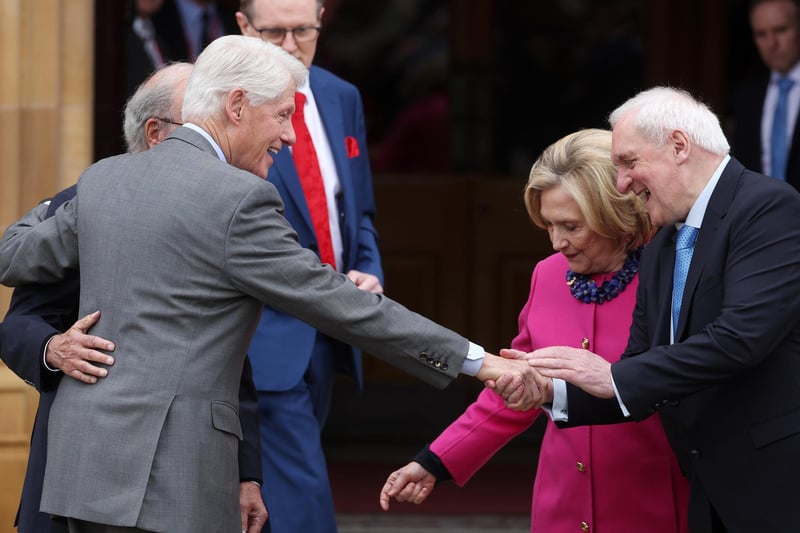 Former American President Bill Clinton is greeted by former Taoiseach Bertie Ahern at Queen’s University, where they were taking part in a conference. Picture by Jonathan Porter/PressEye