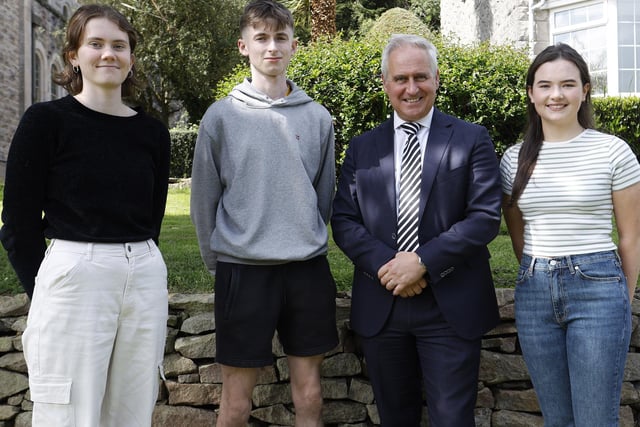 Top achievers Katie Difford with seven A Stars and two A grades, Oran McClintock with seven A Stars and three As and Eleanor Fyfe with seven A Stars and 3 As with Mr Brady.
