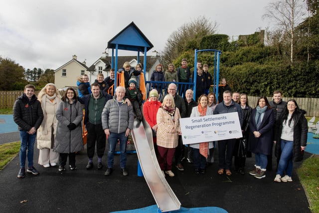 Elected members, Council staff, Department for Communities officials, local residents and pupils from St Olcan’s PS and Armoy PS at the launch of the revamped Armoy Playpark.