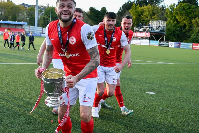 Andy Ryan of Larne with the Gibson Cup.