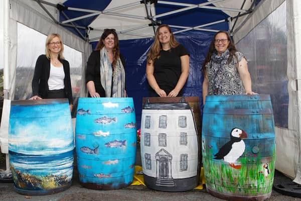 The completed barrels after the live paint on Sunday at Millennium Park in Bushmills. Credit Enterprise Causeway