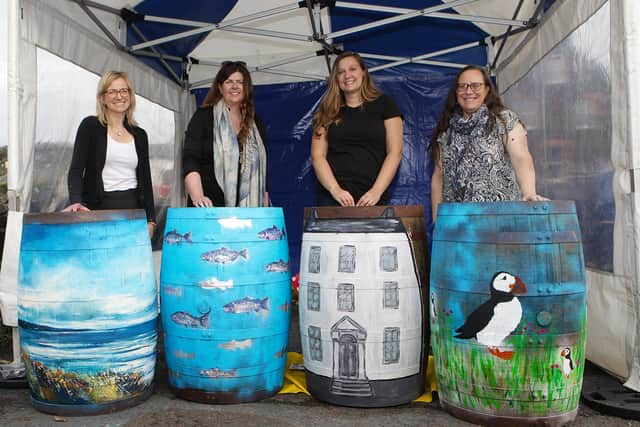 The completed barrels after the live paint on Sunday at Millennium Park in Bushmills. Credit Enterprise Causeway