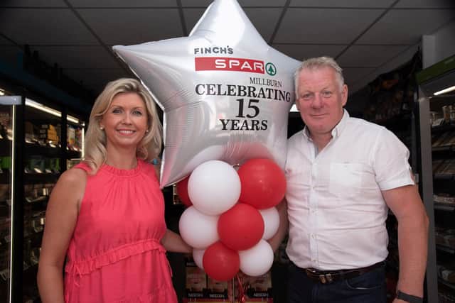 Michelle and Jonathan Finch celebrate 15 years as a SPAR store. Credit: Supplied