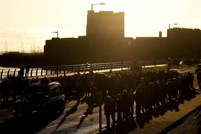 The funeral procession makes its way along Marine Highway. .Picture by Jonathan Porter/PressEye