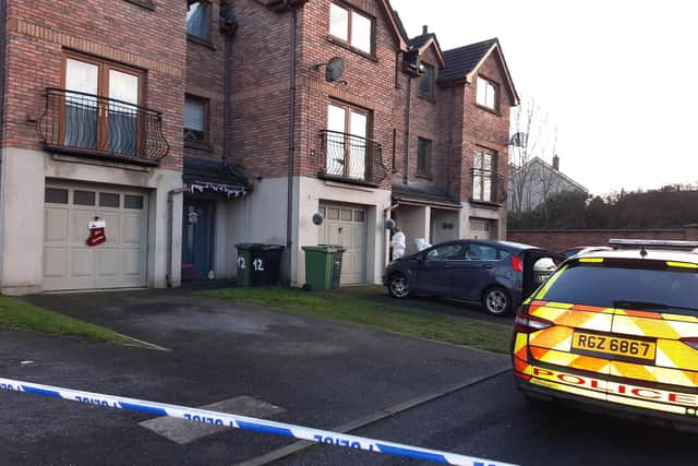 Forensics at the scene of the suspicious death of a woman in Silverwood Green, Lurgan this morning. One man has been arrested on suspicion of murder.