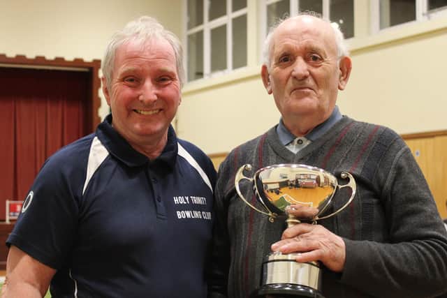 ​Chairman Trevor Anderson with Open Cup winner, Cecil Ringland.